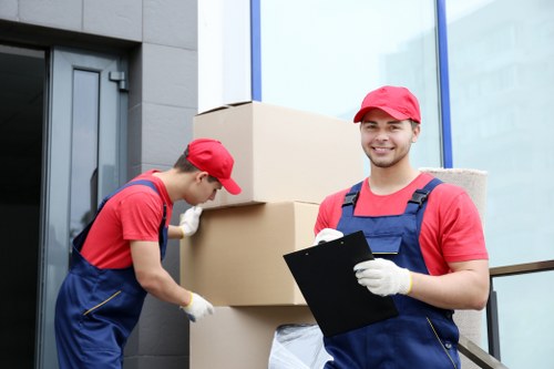Careful furniture moving in a central London property with tight access