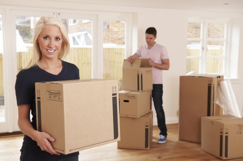 Office furniture and IT equipment being organised for a commercial move