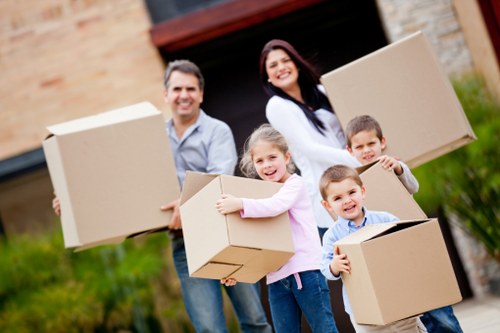 Packed boxes and furniture ready for a Westminster home relocation