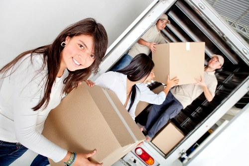 Careful loading of furniture by a Westminster van service