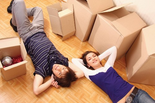 Office moving team handling furniture and files in central Westminster